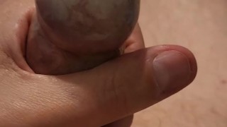 Filling a condom with my cum