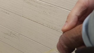 Boy is pissing in toilet / Andris