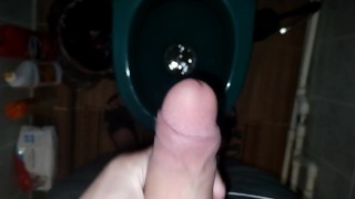 guy pissing with a big standing dick