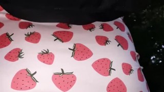 Crossdresser walks through the forest