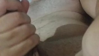 young man touches his penis