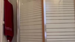 Chubby man showering 