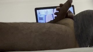 Giving pleasure to my big uncut cock on my bed