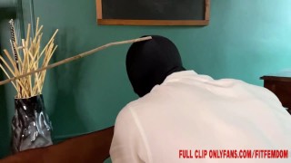 Supermodel Dominatrix Teacher caning over knee of bad student
