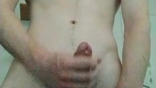 Toned jock jerking off