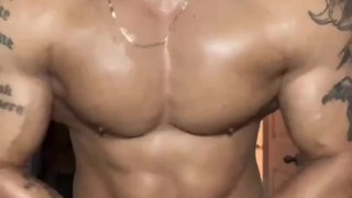 Oiled up Sexy Man Jerks his Big Cock