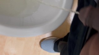 Pissing.