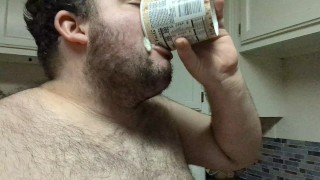 Fat hog chugging ice-cream