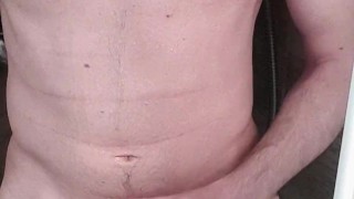 Guy pees on his chest, jerks off, cums a big load and take a shower