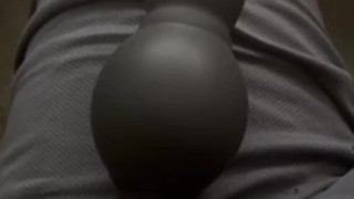 My male submissive practicing with an inflatable buttplug