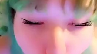 Teen sucking on her dildo