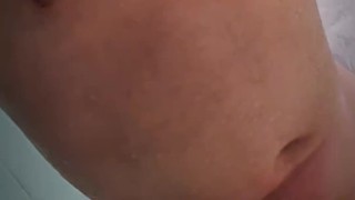 Fit amateur daddy with a big cock cums hard and loud from shower head