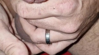 Guy enjoys jerking his cock and cums in his hands