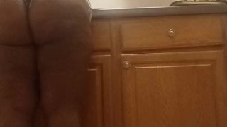 Chunky Ebony Washing Dishes With A Wedgie