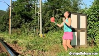 Teen fucked outdoors as traffic passes by