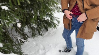 Winter outdoor pissing near the Christmas tree. Yellow snow. Undressing on cold. UHD 4K 60fps