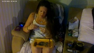 Busty Long Hair Brunette In Bra and Panties Playing Smoking Cigarettes and Playing PlayStation