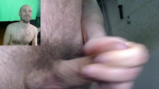 Стоит и дрочит свой волосатый член.