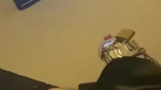 Sissy is watching porn and gets horny in chastity cage