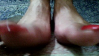 Red long toenails teasing