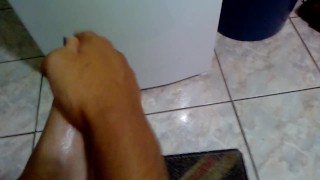 Oilying long blue toenails and feet