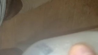 Sean pissin in a bottle