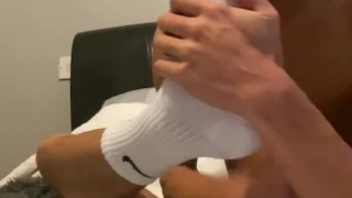 Faggot kisses his own feet while wanking