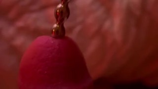 Steel sounding rod in thick white cock