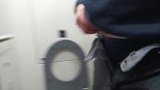 pissing in a public toilet on train