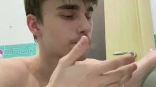 I'm very quietly jerking off in the toilet while my friend is in the next room