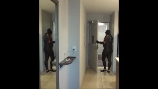 wetsuited orca almost caught at hotel door