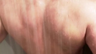 Horny muscle cub showers and shows off his ass in the gym showers