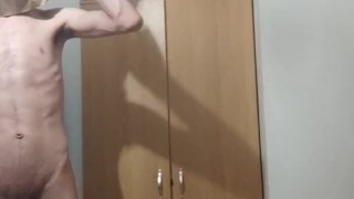 Very erotic skinny teen puts a paper bag over his head and flexes his body