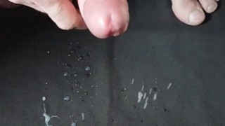 Uncut white dick guy jerks off and cums several shots