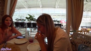 Two girls have fun with remote control vibrators in public places