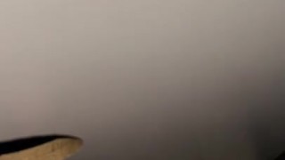 Playing with my cock at the gloryhole