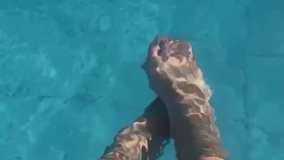 my feet in the pool