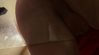 Riding a dildo under the glass