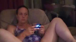 Filming Up Milf's Purple Mini Skirt While She Plays Video Games