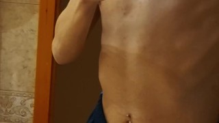 TUMMY PIERCED ARAB TEEN GUY SHOWS OFF HIMSELF IN THE MIRROR
