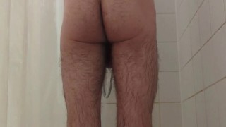 YOUNG TWINK SHOWERS AND PLAYS WITH HIS BIG WET DICK!