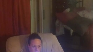 Amateur milf takes off her mini dress and lays on the couch in lingerie playing video games