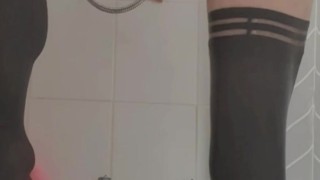 Sissy crossdresser in stockings fucked dildo in shower