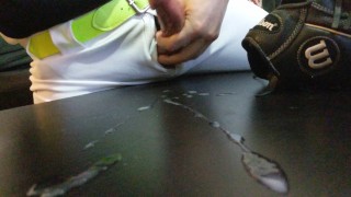 Horny Baseball Player strokes his huge cock after practice and shoots a huge cum load