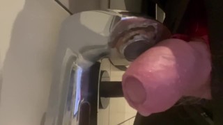 Washing uncut cock in public restroom