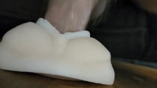 Guy fucks his toy and finishes