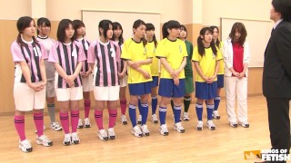 Japanese female team listen and take a lesson from their coach