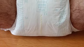 Desperate piss (and fart) in diaper - rubbing it afterwards
