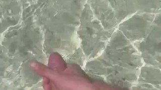 Nice cock exhibitionist wanking at a beautiful beach jerking