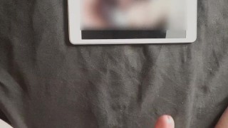 Guy jerks off watching porn and cums over the screen